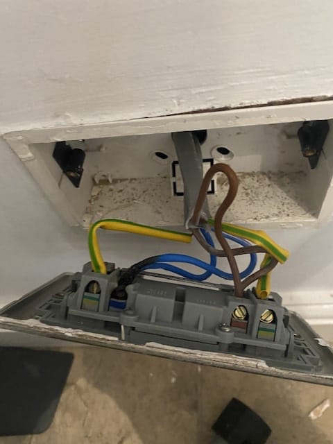 Burnt cabling repaired by an electrician at Complete Maintenance