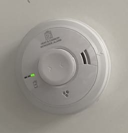 Smoke alarm installed by electrician from Complete Maintenance